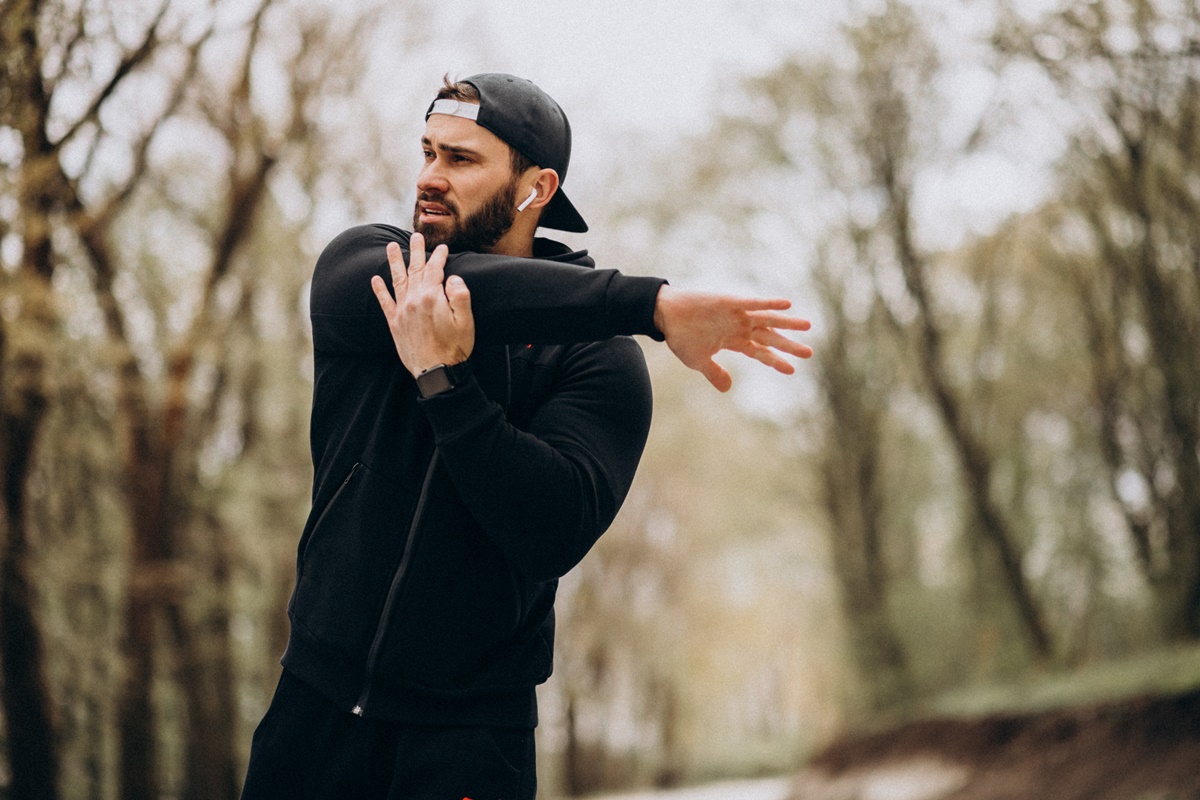 handsome-man-exercising-park-sports-wear